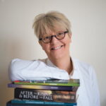 Orna Ross with books