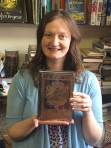 Tanya from Broadford Books with the first edition of The Secret Rose